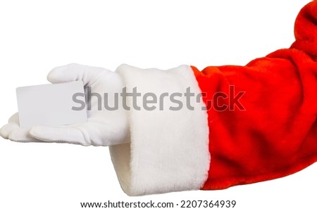 A santa claus hand isolated on the white background