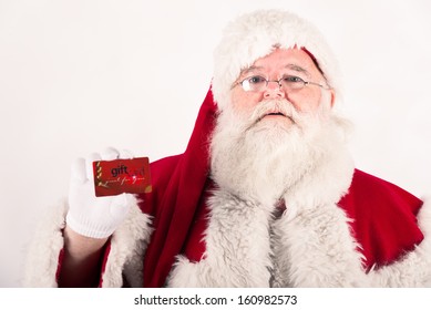 Santa Claus Holding A Gift Card