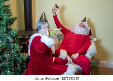 Santa Claus In House Wearing Red Long Johns Celebrating New Year's Eve With The  Mrs.