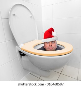 Santa Claus looking from the toilet bowl. Theme for funny christmas cards.