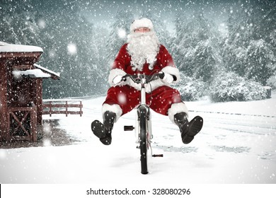 Santa Claus On Bike And Snow 