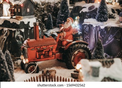 santa claus on tractor in forest - Shutterstock ID 1569432562