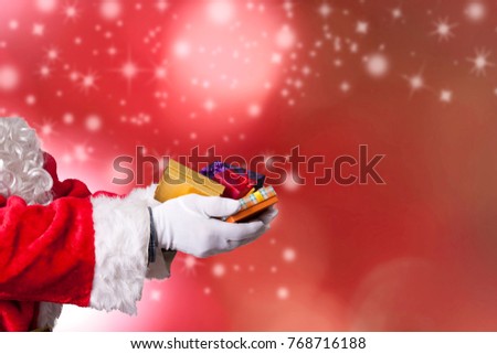 santa claus or papa noel with hands full of christmas gifts Foto stock © 
