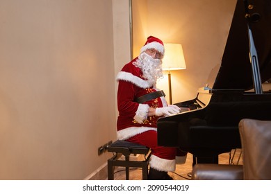 Santa Claus Playing A Piano Indoors