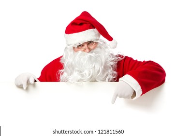 Santa Claus pointing in blank advertisement banner isolated on white background with copy space - Powered by Shutterstock