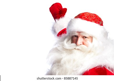 Santa Claus pointing his hand isolated over white. - Powered by Shutterstock