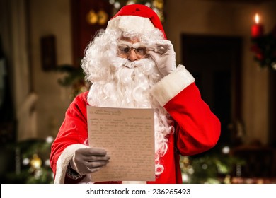 Santa Claus Reading A Letter