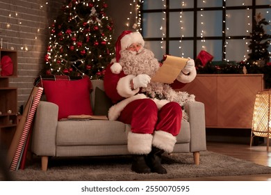 Santa Claus reading letter at home on Christmas eve