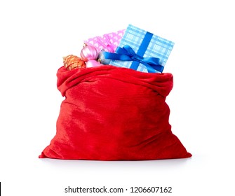 Santa Claus red bag full of Christmas boxes with gifts, isolated on white background. File contains a path to isolation