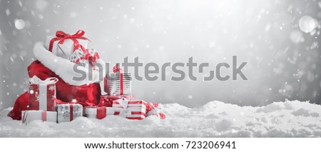 Santa Claus red bag with gift boxes. 
