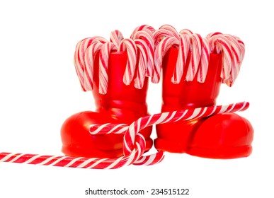 Santa Claus Red Boots, Shoes With Colored Sweet Lollipops, Candys. Saint Nicholas Boots With Presents, Gifts.