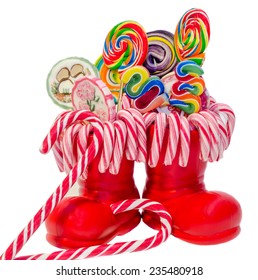 Santa Claus Red Boots, Shoes With Colored Sweet Lollipops, Candys. Saint Nicholas Boots With Presents, Gifts