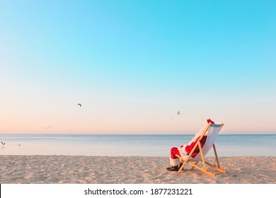 Santa Claus Resting At Sea Resort. Christmas Vacation