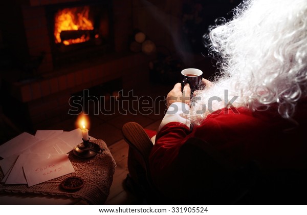 Santa Claus Rests Hut Fireplace Hot Stock Photo Edit Now 331905524