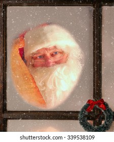 Santa Claus Seen Through The Frosted Window Of His North Pole Workshop Holding His Naughty And Nice List. It Is Snowing Outside.