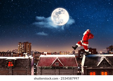 Santa Claus walks between the roofs with a sack of gifts. Starry winter night, full moon. Waiting for Christmas. - Powered by Shutterstock