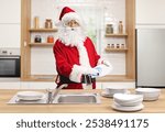 Santa claus washing dishes in a kitchen