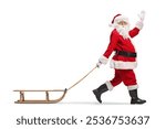 Santa Claus waving and pulling a wooden sled isolated on white background  