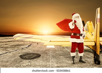 Santa Claus And Yellow Small Plane 