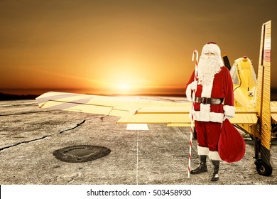 Santa Claus And Yellow Small Plane 