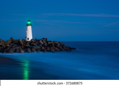 Santa Cruz Breakwater Lighthouse In Santa Cruz, California At Night