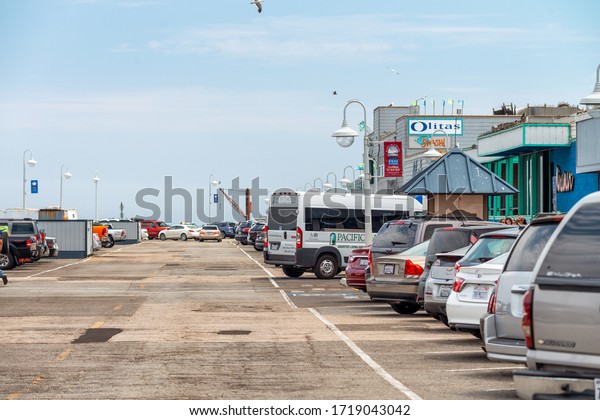 SANTA CRUZ, CA - AUGUST 4, 2017: Car parking on the\
Santa Cruz Pier.