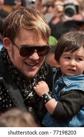 SANTA CRUZ, CA - MAY 14: American Idol Performer James Durbin Carries His Son Hunter To A Hometown Event At The Loudin Nelson Community Center On May 14, 2011 In Santa Cruz, CA.