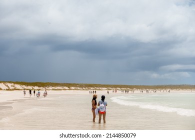 SANTA CRUZ ISLAND, GALAPAGOS ISLANDS, ECUADOR - MARCH 12, 2022: People Visit Tortuga Bay, A Beach That Is Home To A Wide Range Of Galapagos Islands Wildlife Species. 