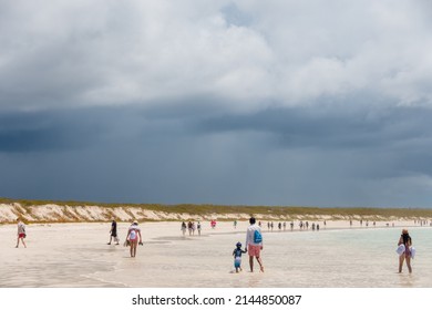 SANTA CRUZ ISLAND, GALAPAGOS ISLANDS, ECUADOR - MARCH 12, 2022: People Visit Tortuga Bay, A Beach That Is Home To A Wide Range Of Galapagos Islands Wildlife Species. 