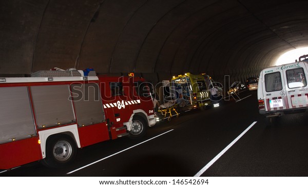 SANTA CRUZ, SPAIN - JULY 17: Severe traffic accident in
highway underground tunnel on July 17, 2013 in Santa Cruz, Spain
