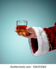 Santa Holding With A Beer Glass Over Blue