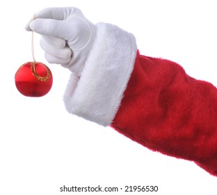 Santa Holding Christmas Ornament Isolated Over White - Hand And Arm Only