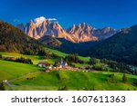 Santa Maddalena (Santa Magdalena) village with magical Dolomites mountains in background, Val di Funes valley, Trentino Alto Adige region, South Tyrol, Italy, Europe. Santa Maddalena Village, Italy. 