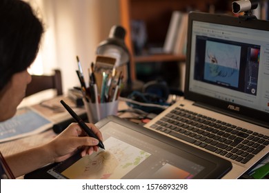 Santa Maria Capua, Caserta, Italy, December 01th 2019, A Young Girl Is Learning Digital Drawing In A YouTube Tutorial