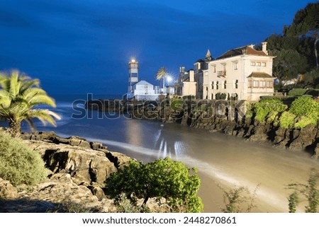 Santa Marta Lighthouse Museum and Casa Museu de Santa Maria floodlit at dawn, Cascais, Lisbon Region, Portugal, Europe