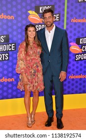 SANTA MONICA, CA. July 19, 2018: Danica Patrick & Aaron Rodgers At The Nickelodeon Kids' Choice Sports Awards 2018 At Barker Hangar