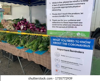 Santa Monica, CA/ United States/ May 13, 2020: Santa Monica Farmer's Market With Covid 19/Coronavirus Restrictions In Place Including Masks And Six Foot Distancing