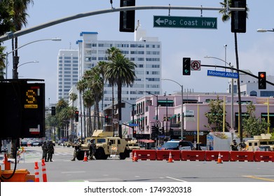 Santa Monica, CA / United States - June 4, 2020: Unidentified Members Of The National Guard, And The Santa Monica Police Department Stand Guard Near The Corner Of Ocean Avenue And Colorado Avenue.