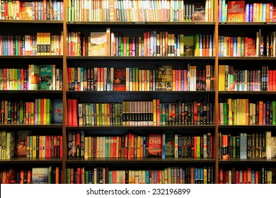 Santa Monica, California, USA - November 16, 2014: Many Different Books are arranged in order on Wooden Bookcases