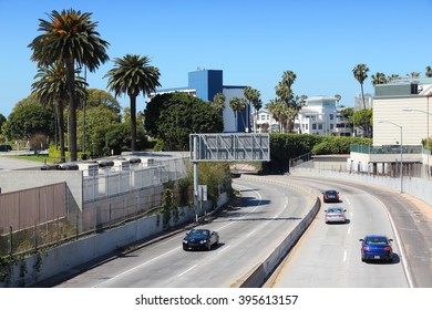 SANTA MONICA, UNITED STATES - APRIL 6, 2014: People Drive Interstate 10 Highway In Santa Monica, California. The Freeway Is Part Of 47,856 Miles Long Interstate Highway System.