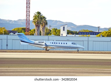 SANTA MONICA/CALIFORNIA - NOV. 22, 2015: Learjet-45 fixed wing multi engine (turbo fan) aircraft taxiing on tarmac after arriving at Santa Monica Airport in Santa Monica, California USA