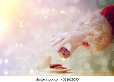Santa picking cookie 