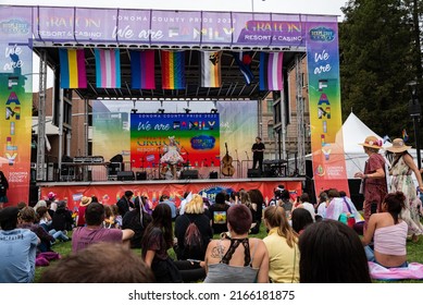 SANTA ROSA, CA, U.S.A. - JUNE 4, 2022: Performance Stage And Audience At Sonoma County Pride, With Emcee Rock M. Sakura.  Sakura Is A Drag Queen From The 12th Season Of RuPaul’s Drag Race.