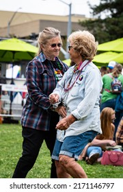 SANTA ROSA, CALIFORNIA - JUNE 4, 2022: Photo Of Two Women Dancing Together During The Sonoma County Pride Festival In Old Courthouse Square.