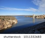 Santa Rosa Lake and Dam in New Mexico as viewed from the top of the man-made dam, holding back the waters of the Pecos River for use in the coming agriculture season for irrigation. 