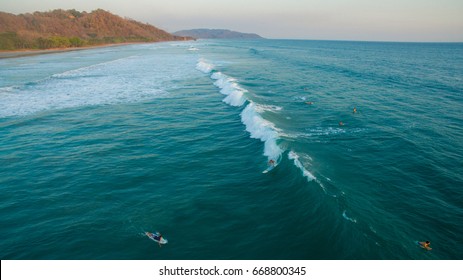 Santa Teresa, Costa Rica - April 6, 2016: Aerial view of a surfer on a wave in Santa Teresa, Costa Rica