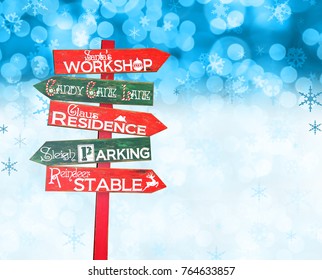 Santa Workshop Sign On A Christmas Snow Background.