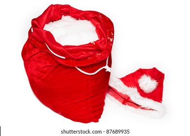 Santa's Cap And Empty Bag On White Background