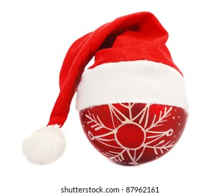Santa's christmas hat and Christmas ball on a white background