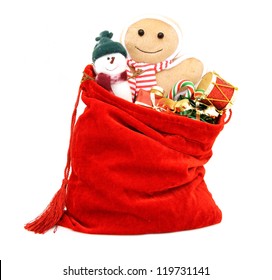 Santa's Gift Bag Full Of Toys And Gifts Over White